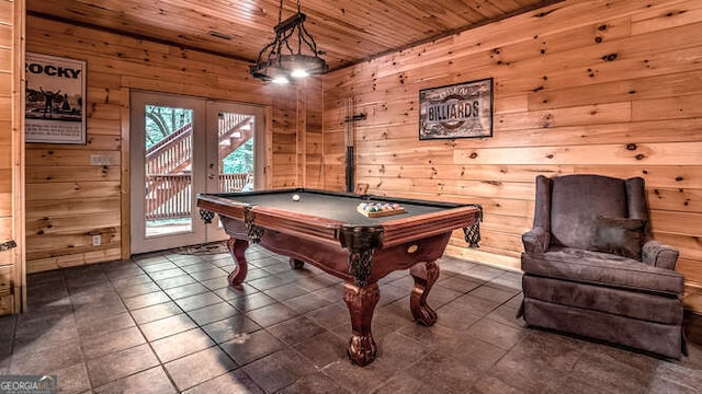 rec room featuring wood ceiling, billiards, dark tile patterned flooring, french doors, and wood walls