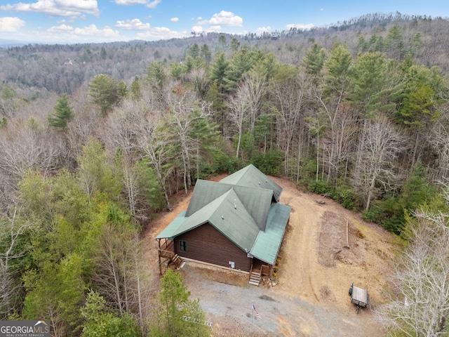 aerial view featuring a forest view