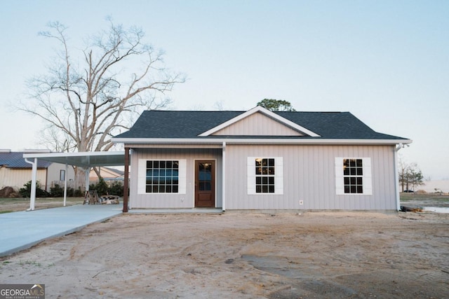 view of front of house featuring a carport