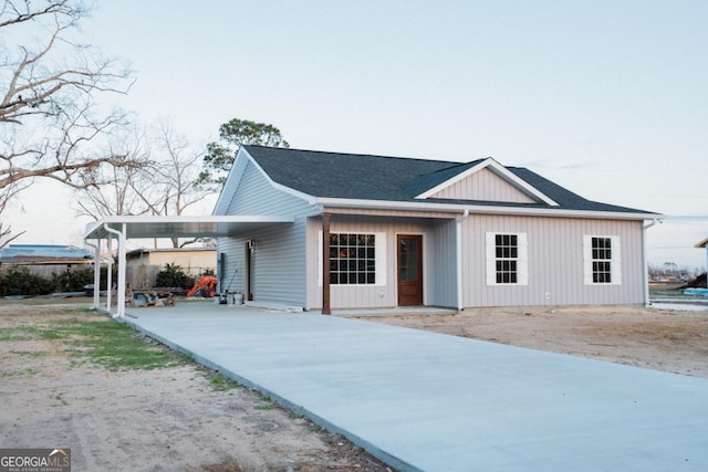 view of front of house featuring a carport