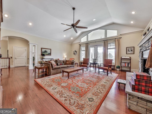 living room with french doors, hardwood / wood-style flooring, crown molding, and ceiling fan