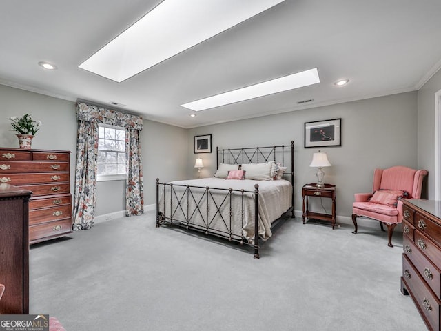 carpeted bedroom with crown molding and a skylight