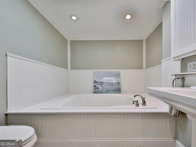 bathroom with toilet and a bathing tub