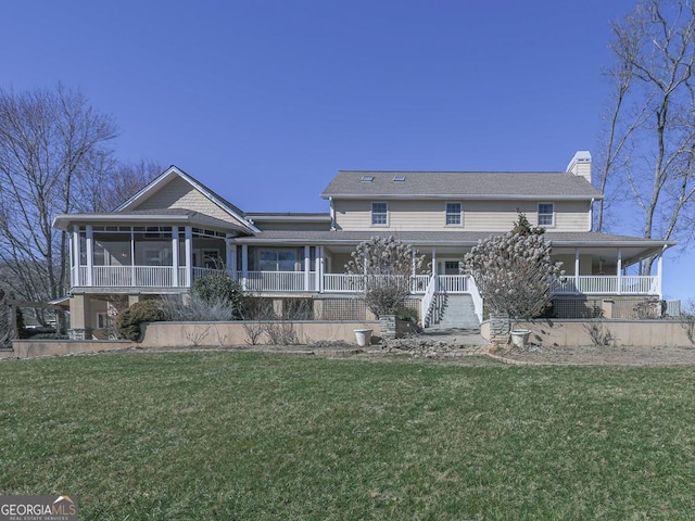 country-style home featuring a porch, a sunroom, and a front lawn