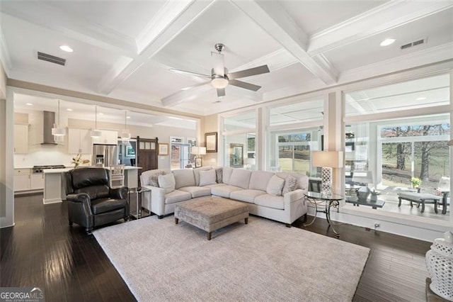 living room featuring beam ceiling, ceiling fan, dark hardwood / wood-style floors, and coffered ceiling