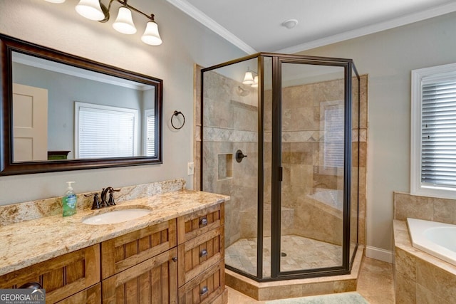 bathroom featuring vanity, ornamental molding, and independent shower and bath