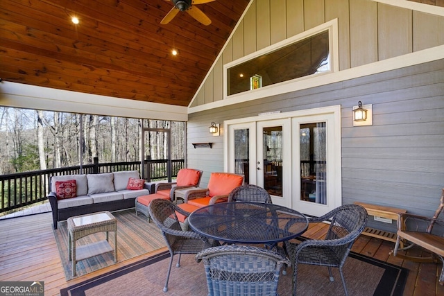 sunroom / solarium featuring wood ceiling, vaulted ceiling, french doors, and ceiling fan