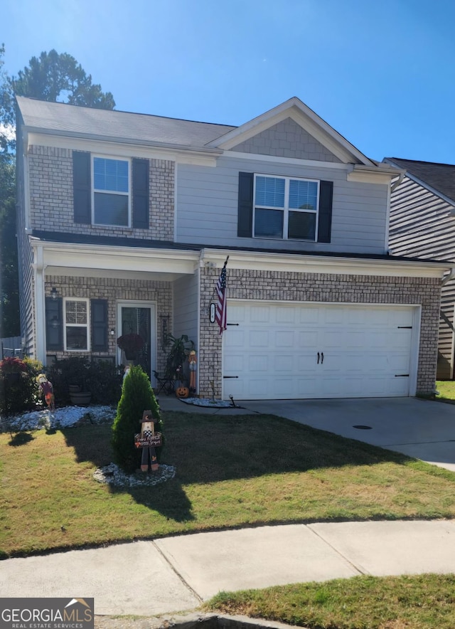 view of front facade with a garage and a front lawn