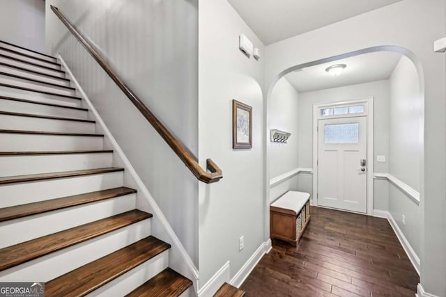 entrance foyer featuring dark wood-type flooring