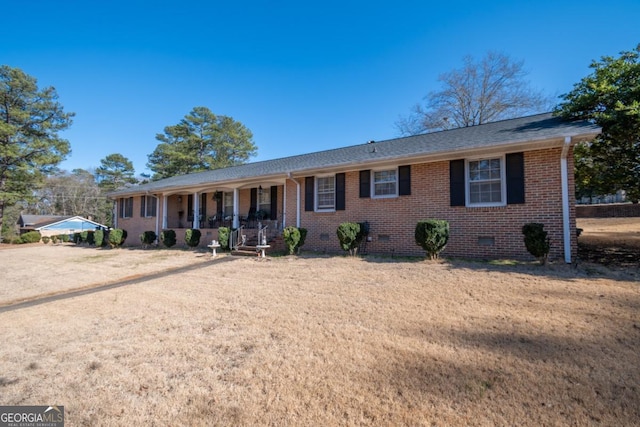 ranch-style home with covered porch