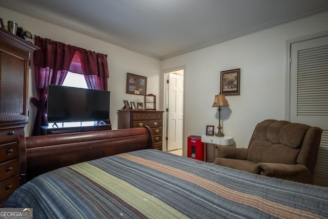 bedroom with crown molding