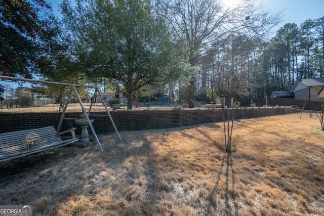 view of yard with a playground