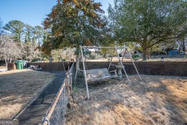 view of yard with a playground