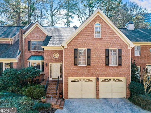 view of front of property with a garage