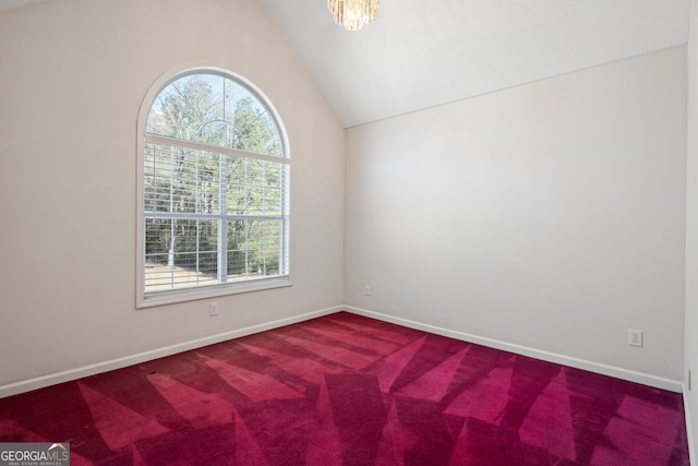 123 Stratmore Pl, Stockbridge, GA 30281 - spare room with lofted ceiling and carpet flooring