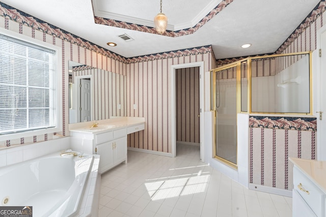 123 Stratmore Pl, Stockbridge, GA 30281 - full bathroom with vanity, wallpapered walls, a shower stall, a garden tub, and a textured ceiling