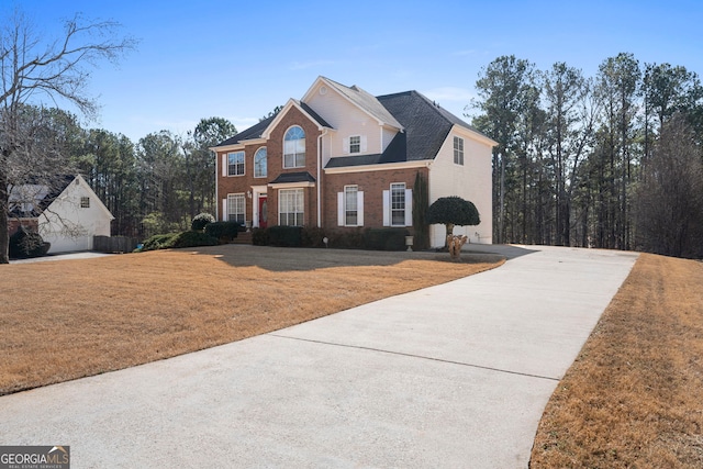 view of property featuring a front yard