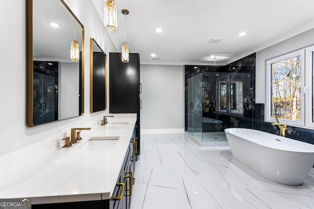 full bath with marble finish floor, double vanity, a soaking tub, a sink, and a shower stall