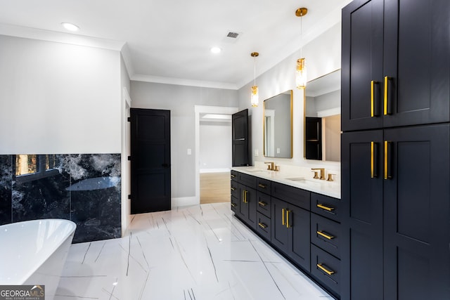 bathroom with visible vents, a soaking tub, ornamental molding, marble finish floor, and a sink