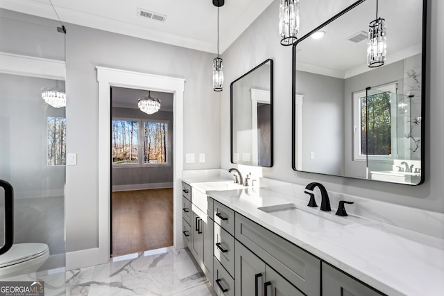 full bathroom featuring double vanity, crown molding, visible vents, and a sink