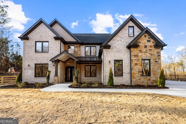 view of front of property with brick siding