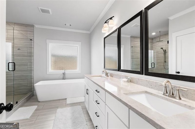 bathroom with shower with separate bathtub, crown molding, and vanity