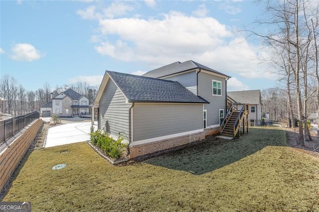 view of property exterior featuring a yard