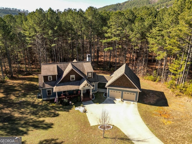 craftsman-style house with a garage and a front yard