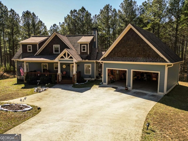 craftsman-style home featuring a porch and a front lawn