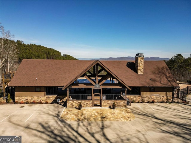 view of front facade featuring a mountain view