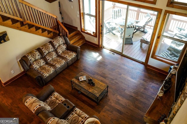 living room with dark hardwood / wood-style floors