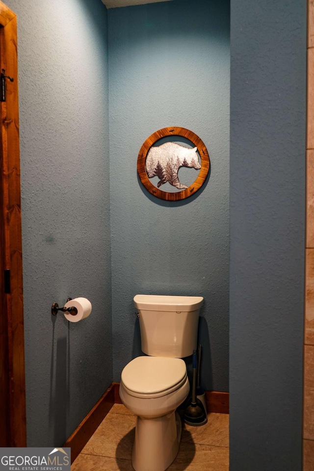 bathroom featuring toilet