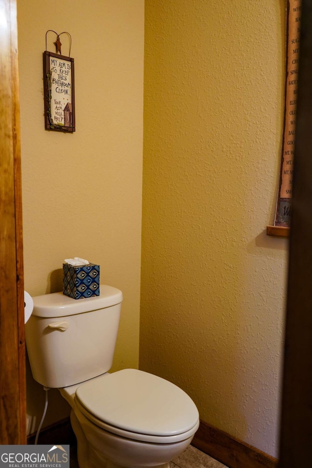 bathroom featuring toilet