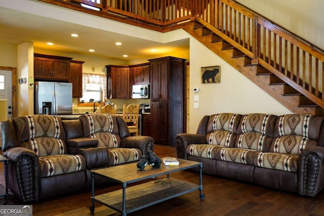 living room with dark wood-type flooring