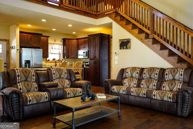 living room featuring dark hardwood / wood-style flooring