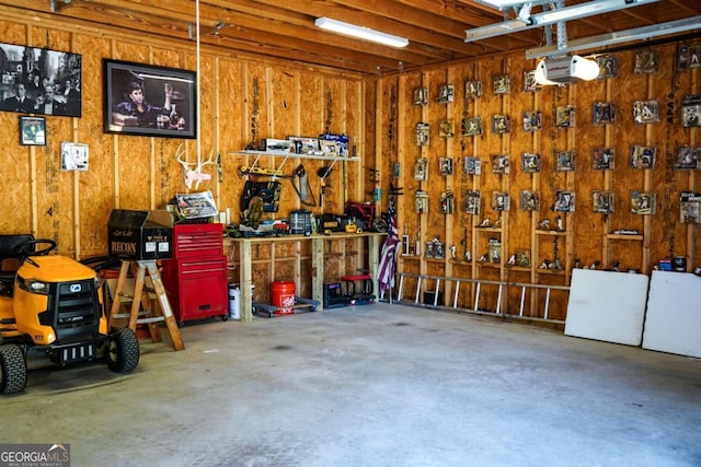 garage with a workshop area