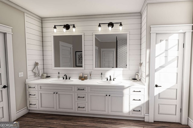 full bath with double vanity, wood finished floors, and a sink