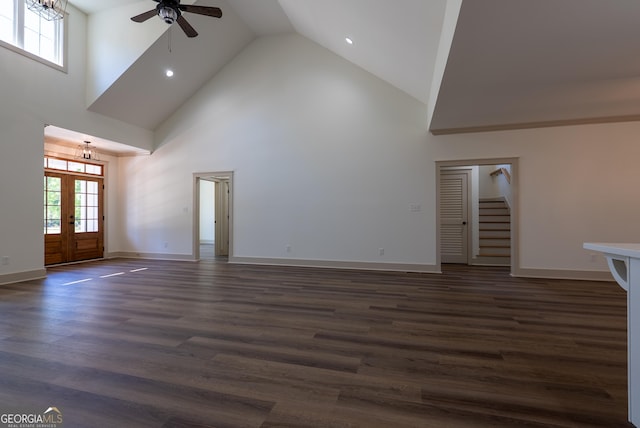 unfurnished living room with high vaulted ceiling, ceiling fan, dark wood-style flooring, baseboards, and recessed lighting