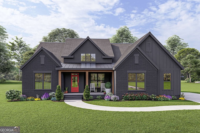 view of front of home featuring covered porch, board and batten siding, a front lawn, and a standing seam roof