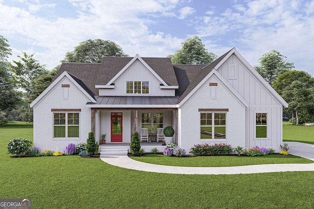 modern farmhouse style home with a standing seam roof, roof with shingles, covered porch, board and batten siding, and a front yard