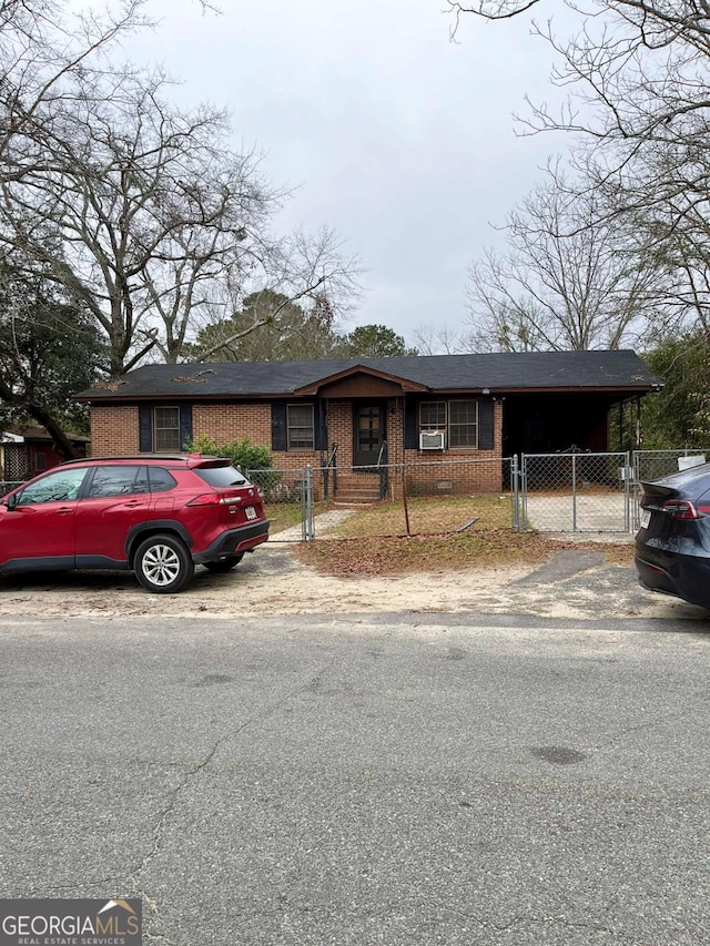 view of front of home with a carport