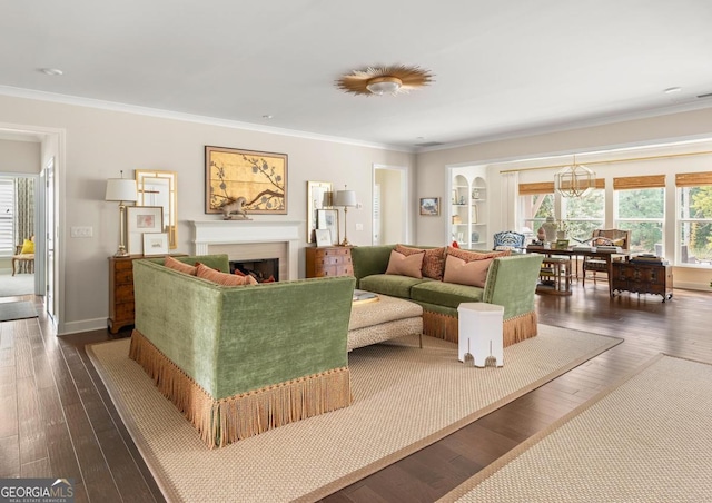 living room with ornamental molding and dark hardwood / wood-style floors