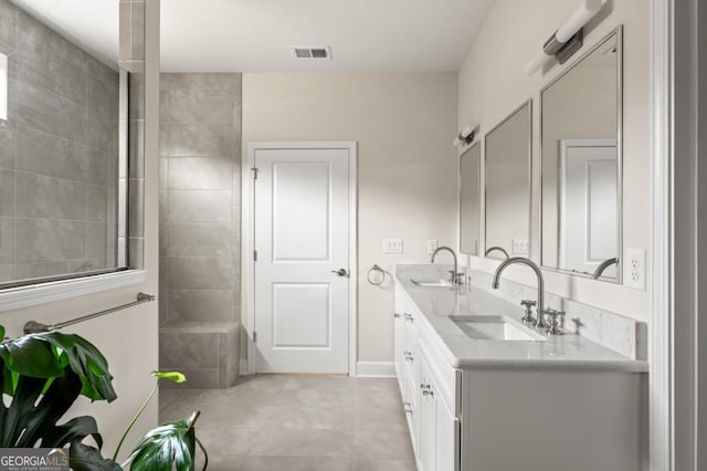 bathroom featuring vanity and tile patterned floors