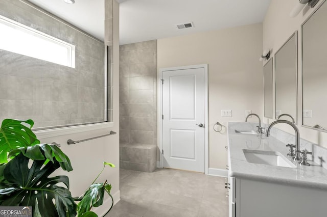 bathroom featuring vanity and tile patterned floors