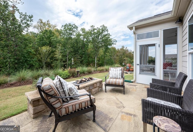 view of patio featuring a fire pit