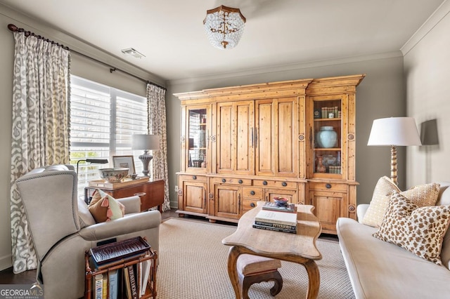 living room featuring crown molding