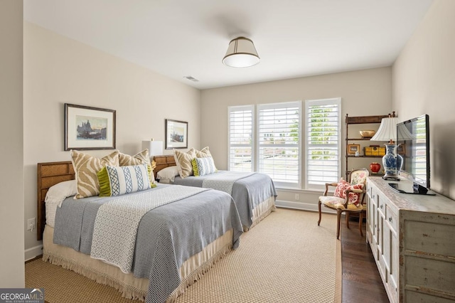 bedroom featuring hardwood / wood-style floors