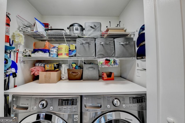 washroom featuring laundry area and independent washer and dryer