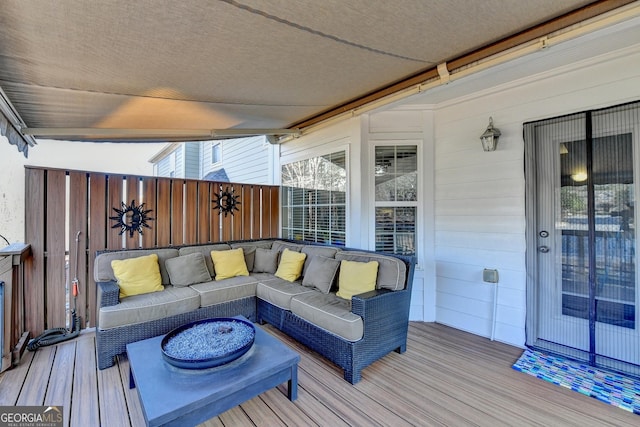 deck with an outdoor hangout area