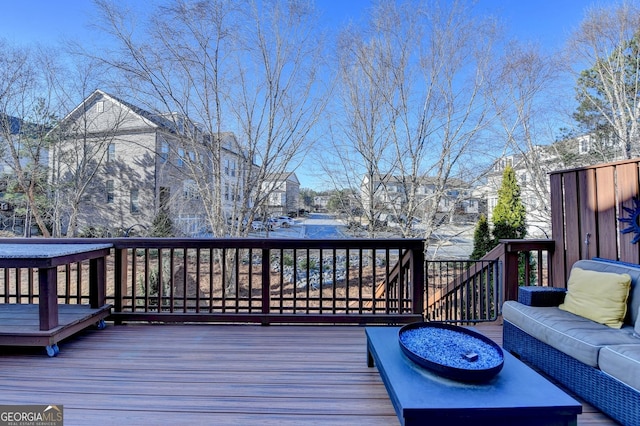 deck featuring outdoor lounge area